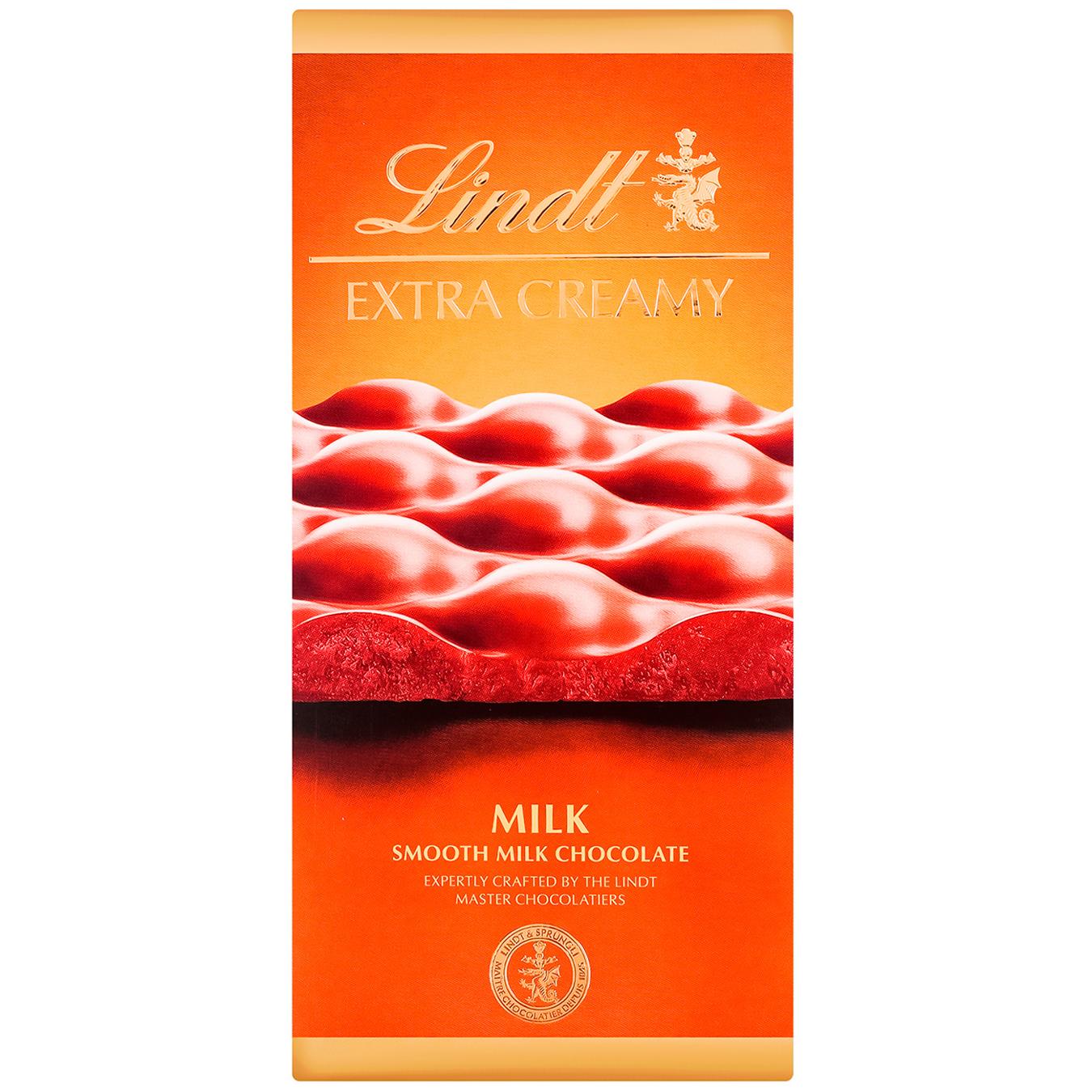 Шоколад молочний Lindt Exra Creamy 80г — фото продукту