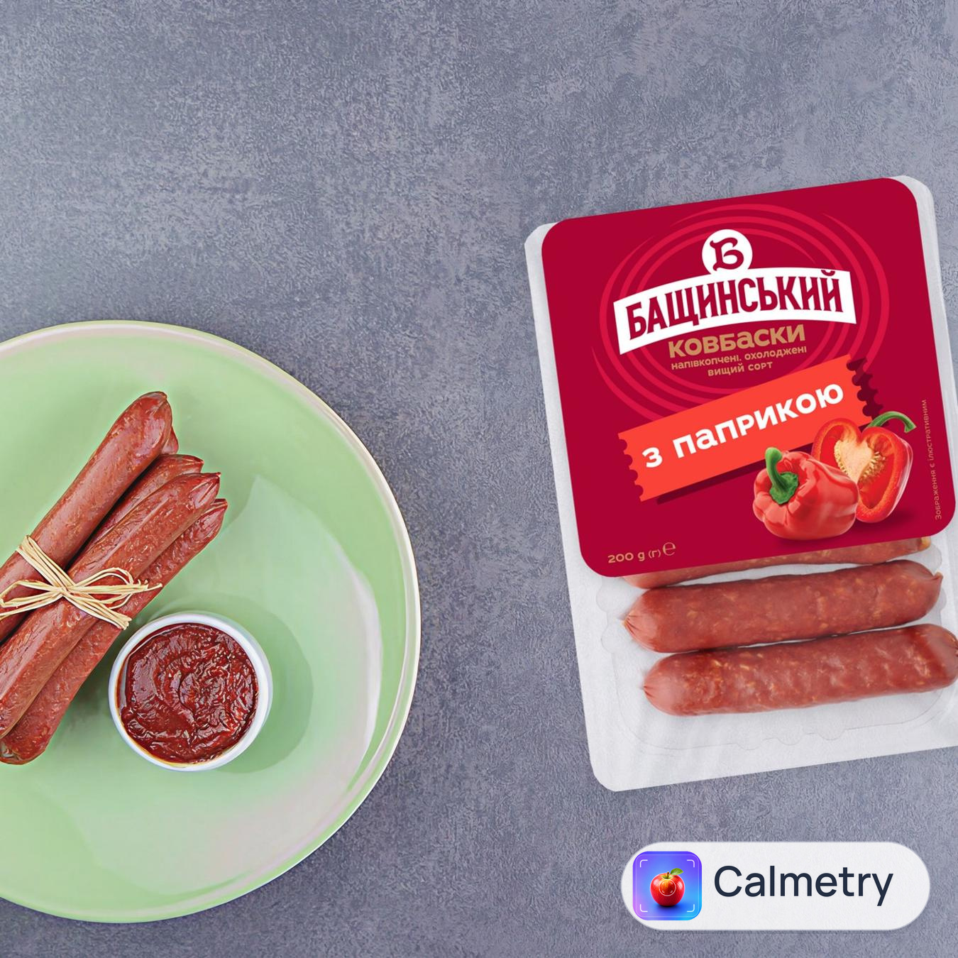 Ковбаски Бащинський з паприкою напівкопчені вищий сорт 200г — фото продукту