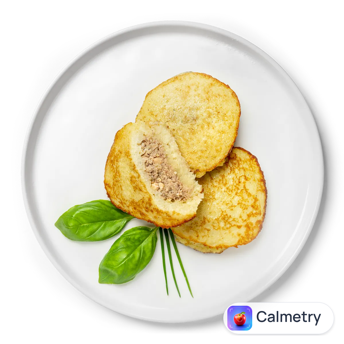 Деруни фаршировані м'ясом