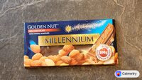 MILLENNIUM молочний шоколад з мигдалем — фото продукту
