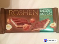Молочний шоколад з горіховою нугою — фото продукту