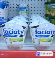 Łaciaty натуральний пухкий сир — фото продукту